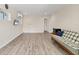 Open finished interior with light grey vinyl flooring and modern fixtures at 3045 Logue Rd, Myakka City, FL 34251