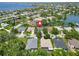 Beautiful aerial view of homes, pools, and waterfront access on the lake at 315 36Th Ne St, Bradenton, FL 34208