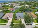 Beautiful aerial view of homes, pools, and waterfront access on the lake at 315 36Th Ne St, Bradenton, FL 34208