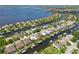 A stunning aerial view of homes on canals, offering direct water access and boat docks, leading to bay at 315 36Th Ne St, Bradenton, FL 34208