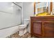 Well-lit bathroom features pebble tile flooring and a modern vessel sink and vanity at 315 36Th Ne St, Bradenton, FL 34208