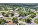 Aerial view of a neighborhood featuring tree-lined streets, well-maintained homes, and lush landscaping at 3240 6Th St, Sarasota, FL 34237