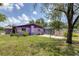 This property has a spacious backyard with lush greenery, perfect for outdoor activities at 3240 6Th St, Sarasota, FL 34237