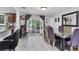 Dining room featuring a door to the patio and access to the kitchen at 3240 6Th St, Sarasota, FL 34237