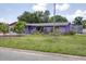 Charming exterior view of this inviting single-Gathering home with well-maintained landscaping at 3240 6Th St, Sarasota, FL 34237