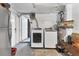 Functional laundry room with a washer, dryer, and access to storage at 3240 6Th St, Sarasota, FL 34237
