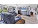 Comfortable living room featuring updated flooring, and cozy seating at 3240 6Th St, Sarasota, FL 34237