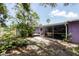 This home offers a screened-in patio perfect for enjoying the outdoors with mature landscaping at 3240 6Th St, Sarasota, FL 34237