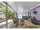 Inviting outdoor patio with wicker furniture and a clear view of the pool and hot tub at 3240 6Th St, Sarasota, FL 34237