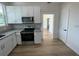Bright and modern kitchen featuring newly installed stainless steel appliances, and ample cabinet space at 3429 37Th N St, St Petersburg, FL 33713