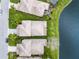 Overhead view highlighting residential properties with lake access, emphasizing the community's layout at 3671 Summerwind Cir, Bradenton, FL 34209
