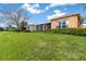 Well-maintained backyard with lush greenery, showcasing the property's spaciousness and serene setting at 3671 Summerwind Cir, Bradenton, FL 34209