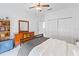 Bedroom featuring a bed, dresser, closet, and neutral tones at 3671 Summerwind Cir, Bradenton, FL 34209
