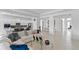 Expansive open-concept living space with modern furnishings, connecting the living room and kitchen at 3671 Summerwind Cir, Bradenton, FL 34209