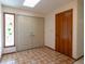 Welcoming foyer with tiled floors, double doors, and stained glass window at 3804 65Th E St, Bradenton, FL 34208