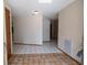 Open-concept living room featuring neutral paint, tiled floors, and plenty of space at 3804 65Th E St, Bradenton, FL 34208
