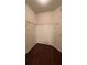Walk-in closet with wood floor and wire shelving at 4207 S Dale Mabry Hwy # 6308, Tampa, FL 33611