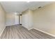 This bedroom features wood-look flooring and a double door closet at 444 Flamingo Dr, Apollo Beach, FL 33572