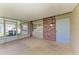 Covered patio with brick accents, a blue door and outdoor space for relaxing and entertaining at 444 Flamingo Dr, Apollo Beach, FL 33572