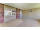 Covered patio with neutral brickwork, offering a blank canvas for outdoor living and entertaining at 444 Flamingo Dr, Apollo Beach, FL 33572
