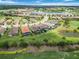 Beautiful aerial shot of neighborhood homes with golf course and waterway views at 4540 Terrazza Ct, Bradenton, FL 34211