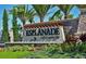 Elegant community sign for Esplanade Golf & Country Club with stone accents and manicured landscaping at 4540 Terrazza Ct, Bradenton, FL 34211