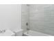 Clean bathroom featuring a tub and shower combination and a single sink vanity at 4796 Duncan Rd, Punta Gorda, FL 33982