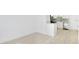Modern kitchen featuring white cabinets, stainless steel appliances, and stone countertops at 4796 Duncan Rd, Punta Gorda, FL 33982