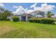 Backyard featuring green grass and an enclosed pool area at 4915 Bookelia Cir, Bradenton, FL 34203