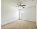 Bright bedroom featuring a ceiling fan and a window allowing natural light at 4915 Bookelia Cir, Bradenton, FL 34203