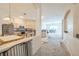 Kitchen with light colored cabinets, granite countertops, and stainless steel appliances at 4915 Bookelia Cir, Bradenton, FL 34203