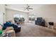 Spacious living room with sliding glass doors and large windows at 4915 Bookelia Cir, Bradenton, FL 34203