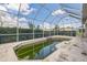 Enclosed pool with frame providing shade and a view of the sky at 4915 Bookelia Cir, Bradenton, FL 34203