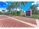 Turtle Rock community entrance sign on Palmer Ranch with lush landscaping and brick paver sidewalks at 4957 Sabal Lake Cir, Sarasota, FL 34238