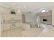 Kitchen with a breakfast bar and a breakfast nook, plus an open floor plan at 4957 Sabal Lake Cir, Sarasota, FL 34238