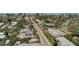 Aerial view of neighborhood street with a canal view, and beachfront access close by at 509 Pine Ave # A, Anna Maria, FL 34216