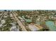 Scenic aerial view of homes along a canal, with convenient access to beach at 509 Pine Ave # A, Anna Maria, FL 34216