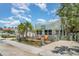 Charming home with a cozy front deck, lush landscaping, and inviting curb appeal at 509 Pine Ave # A, Anna Maria, FL 34216