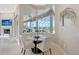 Bright breakfast nook offers views of the lanai, creating a serene dining experience at 520 Rye Ne Rd, Bradenton, FL 34212