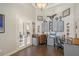 Large office with vaulted ceilings, dark wood floors, and built-in cabinets and desk at 520 Rye Ne Rd, Bradenton, FL 34212