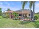 Home boasts a private pool and verdant backyard, ideal for Gathering activities and quiet relaxation at 5523 Secluded Oaks Way, Sarasota, FL 34233