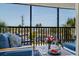 Inviting balcony with comfortable seating and a view of the city and beach at 5600 Beach Way Dr # 315, Sarasota, FL 34242