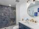 Bathroom showcasing modern fixtures, marble shower, and a stylish vanity at 5600 Beach Way Dr # 315, Sarasota, FL 34242