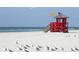Lifeguard stand on a beach with a view of the ocean and white sands at 5600 Beach Way Dr # 315, Sarasota, FL 34242