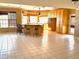 Bright kitchen area with a large island, breakfast bar, and ample cabinet space at 5615 Waneta Pl, Sarasota, FL 34231