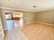 Open floor plan showing the kitchen and living room areas with seamless transitions at 5615 Waneta Pl, Sarasota, FL 34231