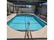 Beautiful screened-in pool with a relaxing outdoor area, perfect for enjoying sunny days and outdoor entertaining at 6406 16Th Avenue W Dr, Bradenton, FL 34209