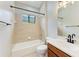 Full bathroom with a shower-tub combo and wood vanity at 6423 Royal Tern Cir, Lakewood Ranch, FL 34202