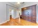 Spacious bedroom features hardwood floors, walk-in closet, and built-in wardrobe at 6423 Royal Tern Cir, Lakewood Ranch, FL 34202