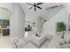Open concept home features soaring ceilings, neutral paint, modern chandelier, and a staircase to the second story at 6423 Royal Tern Cir, Lakewood Ranch, FL 34202